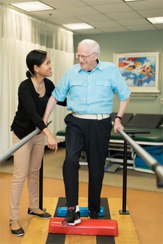 home-callout Physical therapy with senior man at StoneRidge Senior Living