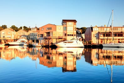 boats docked along the water in Mystic, Connecticut