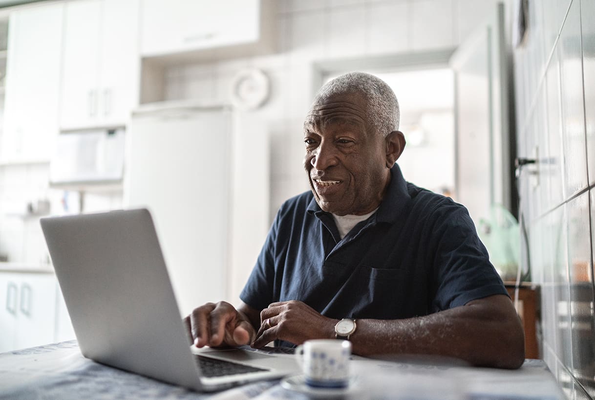 Older man using technology for seniors Older man using technology for seniors