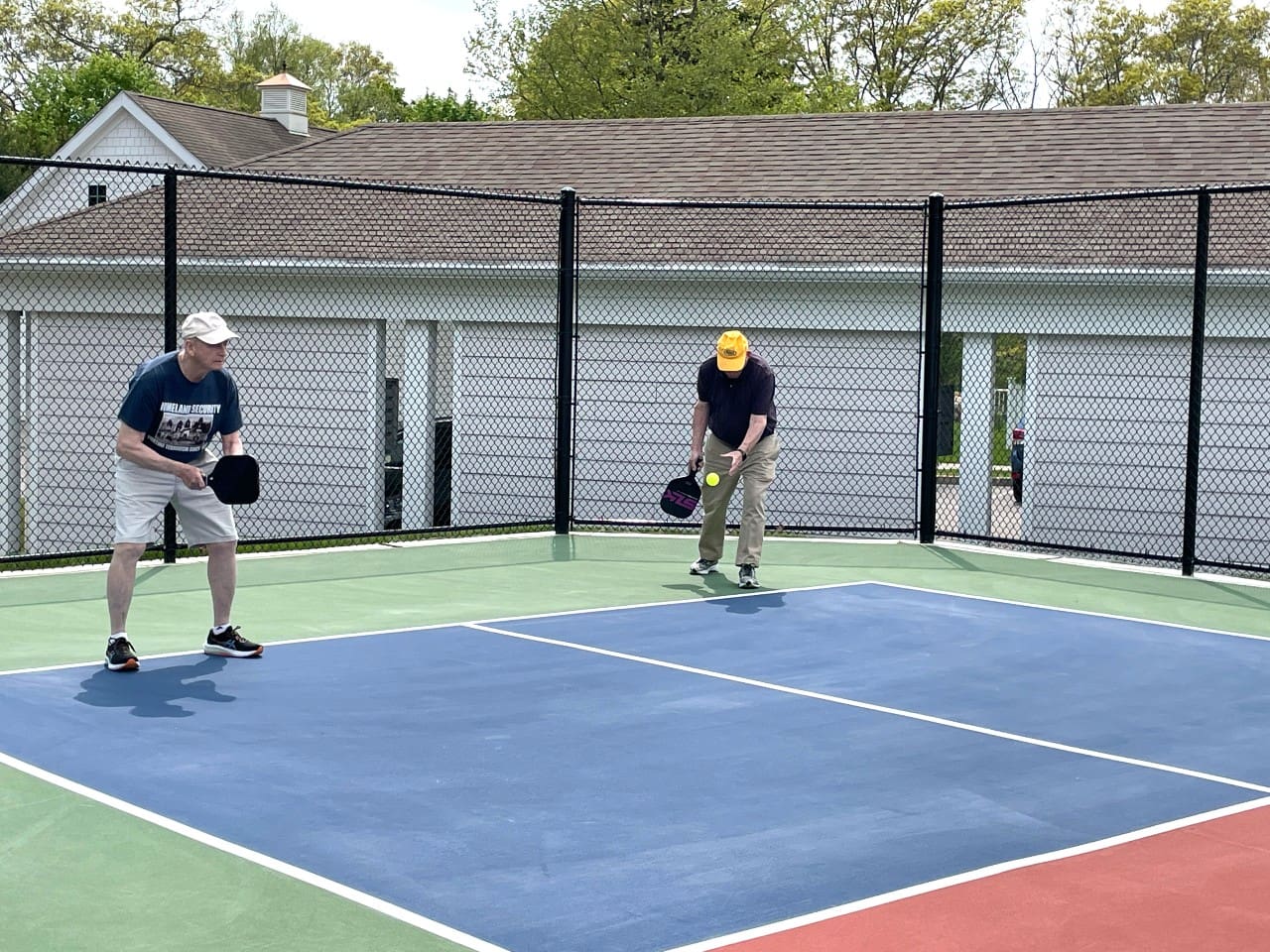 Senior living residents playing pickleball at StoneRidge