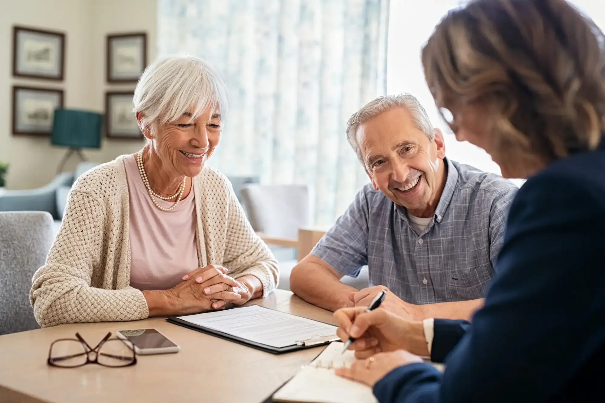 ccrrc-contract-types Senior couple learning about ccrc contract types from expert at StoneRidge in Mystic, CT.