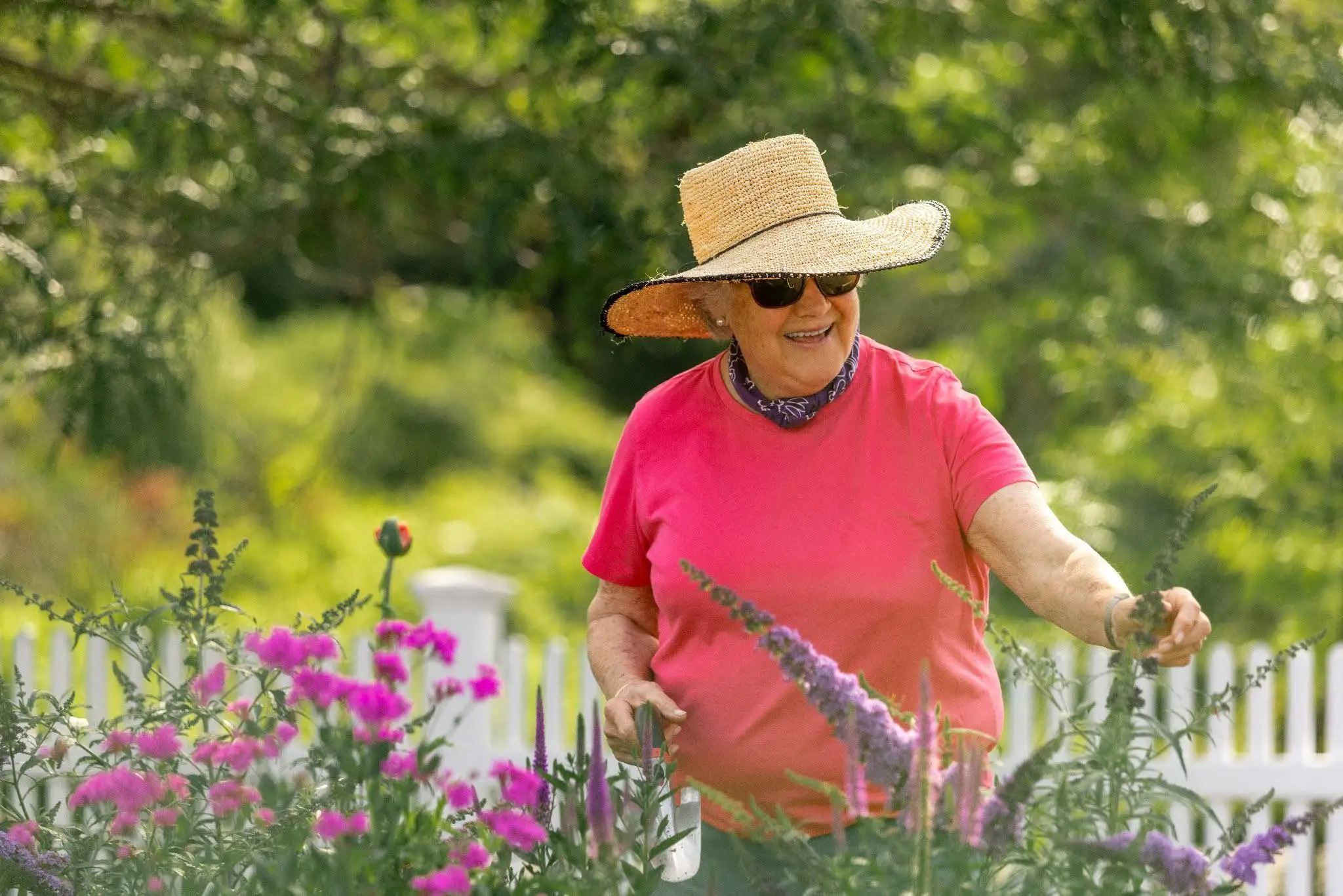 gardening-copy A woman gardening at Stoneridge, a senior living community.